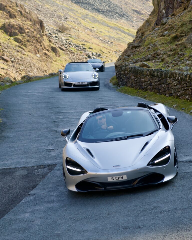 Sports cars travelling together on a Route GT driving tour